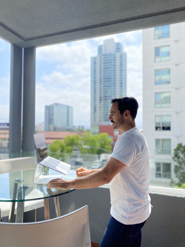 Man Working on Balcony